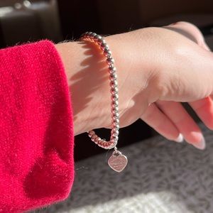 Tiffany heart tag beaded bracelet. In good condition, just not a silver gal!